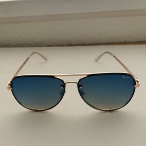 Quay “High Key Rimless” - blue lenses